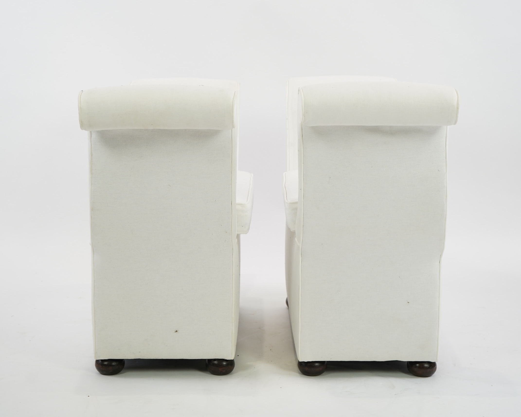 A pair Victorian style upholstered scroll end stools